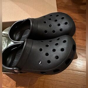 Black Crocs W7 M5 NWT In box never worn